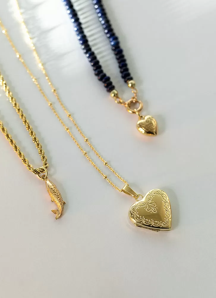 Aphrodite heart medaillon 14k gold