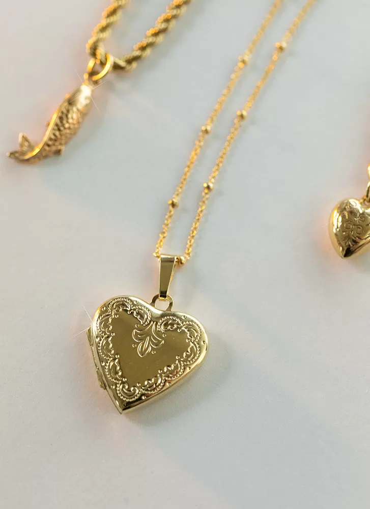 Aphrodite heart medaillon 14k gold