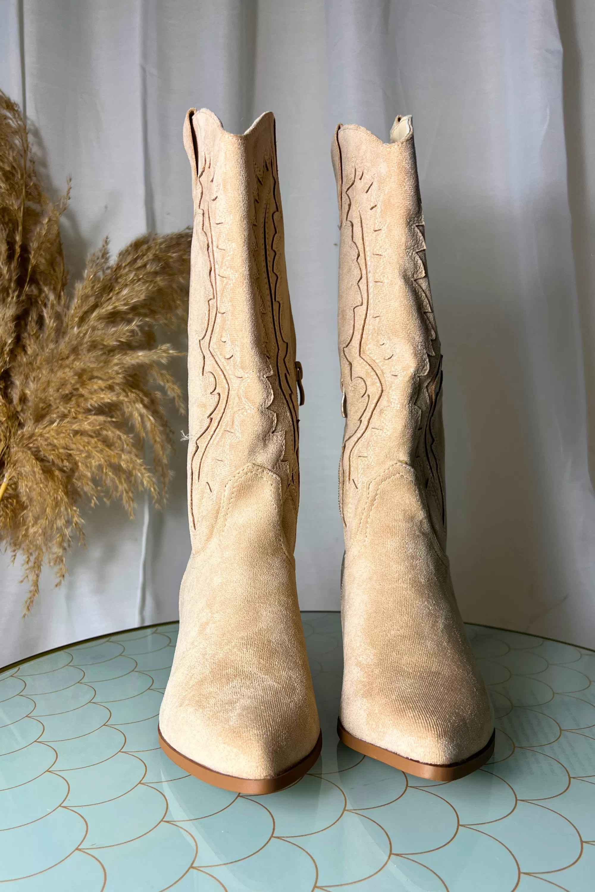 Beige cowboy boots