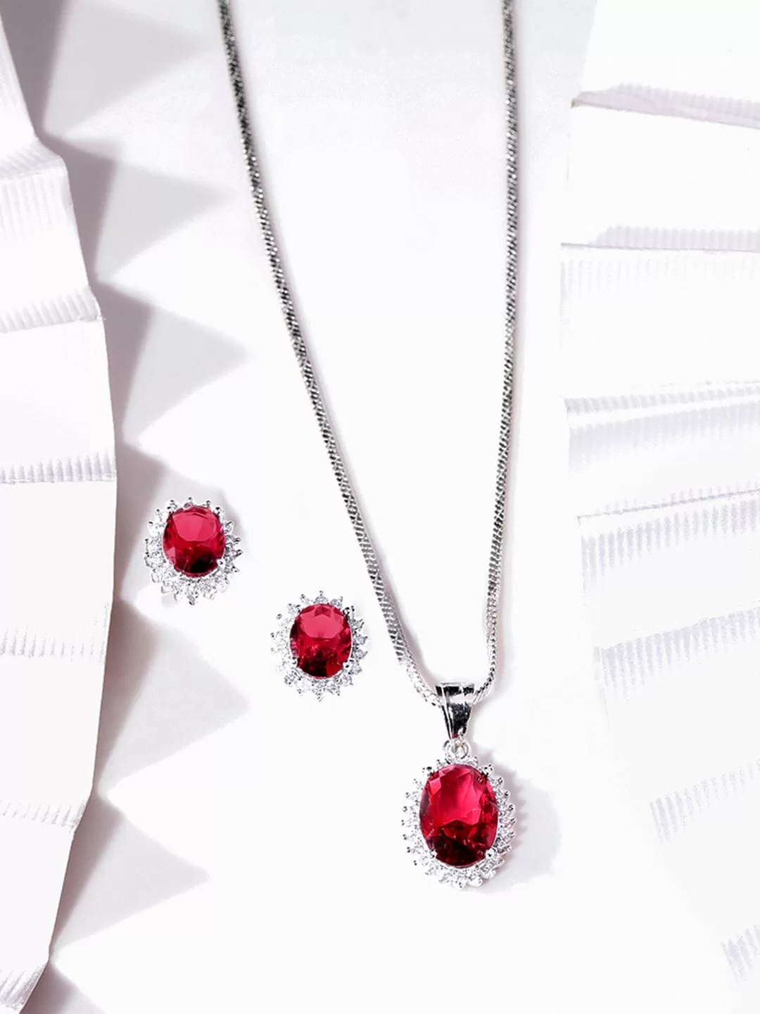 Rubans Rhodium plated Ruby Red zirconia Studded Oval Pendant Set